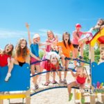 Happy kids playing on playground